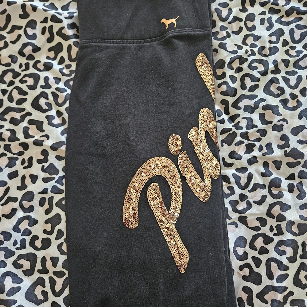 Victoria's Secret Black and Gold Sequin legging.